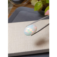 20.97 Ct. Multi Color Cabochon White Opal from Ethiopia Life Style