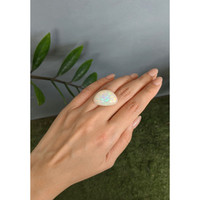 21.48 Ct. Multi Color Cabochon White Opal from Ethiopia Life Style