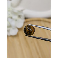 4.54 Ct. Cabochon Tiger's Eye from Ceylon (Sri Lanka) Life Style