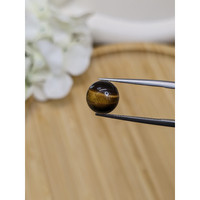 4.95 Ct. Cabochon Tiger's Eye from Ceylon (Sri Lanka) Life Style