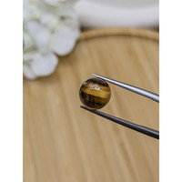 4.53 Ct. Cabochon Tiger's Eye from Ceylon (Sri Lanka) Life Style