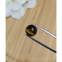 4.76 Ct. Cabochon Tiger's Eye from Ceylon (Sri Lanka) Life Style