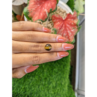 4.56 Ct. Cabochon Tiger's Eye from Ceylon (Sri Lanka) Life Style
