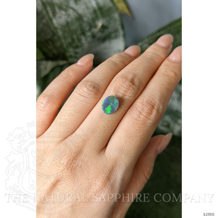 1.66 Ct. Multi Color Cabochon Black Opal from Australia
