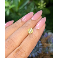 0.97 Ct. Greenish Yellow Cabochon Chrysoberyl from Tanzania Life Style