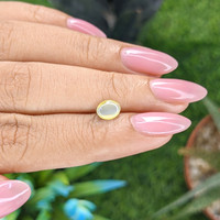 0.97 Ct. Greenish Yellow Cabochon Chrysoberyl from Tanzania Life Style