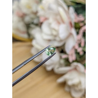0.54 Ct. Green Chrysoberyl from Ceylon (Sri Lanka) Life Style