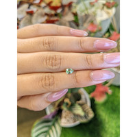 0.54 Ct. Green Chrysoberyl from Ceylon (Sri Lanka) Life Style