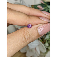 0.49 Ct. Pinkish Purple Rhodolite Garnet from Ceylon (Sri Lanka) Life Style