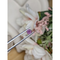 0.49 Ct. Pinkish Purple Rhodolite Garnet from Ceylon (Sri Lanka) Life Style