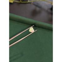 0.52 Ct. Multi Color Cabochon White Opal from Ethiopia Life Style