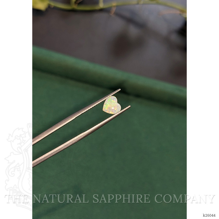0.52 Ct. Multi Color Cabochon White Opal from Ethiopia
