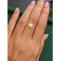 0.52 Ct. Multi Color Cabochon White Opal from Ethiopia Life Style