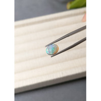 1.22 Ct. Multi Color Cabochon Black Opal from Ethiopia Life Style