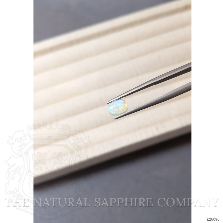 0.77 Ct. Multi Color Cabochon White Opal from Ethiopia