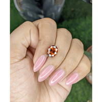 3.73 Ct. Reddish Orange Hessonite Garnet Life Style