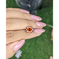 3.73 Ct. Reddish Orange Hessonite Garnet Life Style
