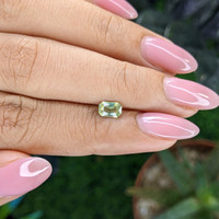 0.58 Ct. Yellowish Green Chrysoberyl from Tanzania Life Style