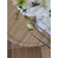 3.03 Ct. Green Cabochon Chrysoberyl from Tanzania Life Style