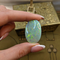 48.40 Ct. Multi Color Cabochon Semi-Black Opal from Australia Life Style