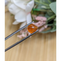 2.48 Ct. Orange Cabochon Hessonite Garnet from Madagascar Life Style