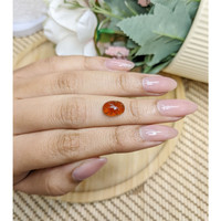 3.44 Ct. Reddish Orange Cabochon Hessonite Garnet from Madagascar Life Style