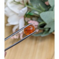 3.44 Ct. Reddish Orange Cabochon Hessonite Garnet from Madagascar Life Style