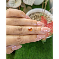 1.48 Ct. Orange Cabochon Hessonite Garnet from Madagascar Life Style