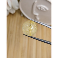 12.73 Ct. Yellow Cabochon Rutilated Quartz from Ceylon (Sri Lanka) Life Style