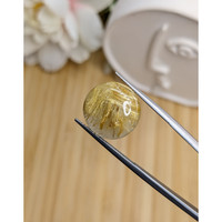7.77 Ct. Yellow Cabochon Rutilated Quartz from Ceylon (Sri Lanka) Life Style