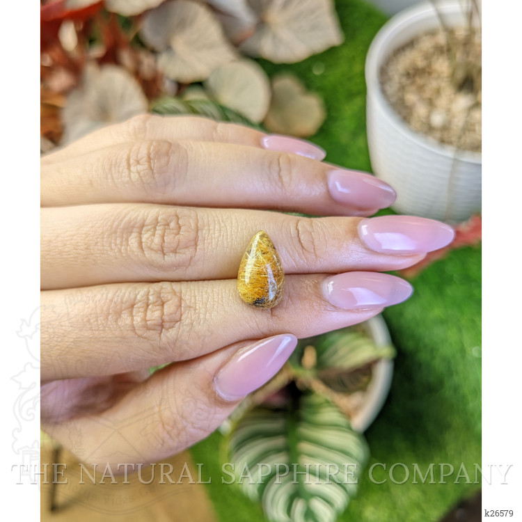 6.93 Ct. Brown Cabochon Rutilated Quartz from Ceylon (Sri Lanka)