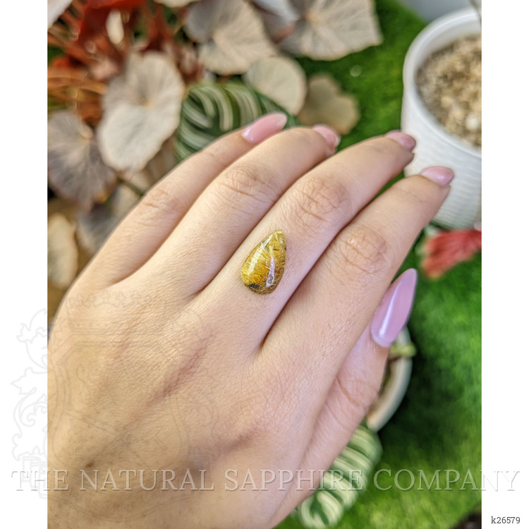 6.93 Ct. Brown Cabochon Rutilated Quartz from Ceylon (Sri Lanka)
