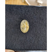 10.89 Ct. Yellow Cabochon Rutilated Quartz from Ceylon (Sri Lanka) Life Style
