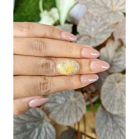 10.89 Ct. Yellow Cabochon Rutilated Quartz from Ceylon (Sri Lanka) Life Style