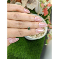 0.97 Ct. Brownish Green Zircon from Ceylon (Sri Lanka) Life Style