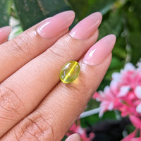 4.58 Ct. Yellowish Green Cabochon Chrysoberyl from Madagascar Life Style
