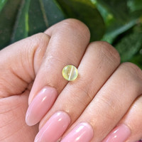 1.58 Ct. Yellowish Green Cabochon Chrysoberyl from Ceylon (Sri Lanka) Life Style