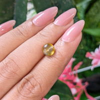 1.85 Ct. Yellowish Brown Cabochon Chrysoberyl from Madagascar Life Style