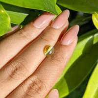 2.32 Ct. Yellowish Green Cabochon Chrysoberyl from Tanzania Life Style