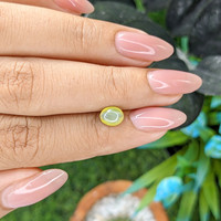 1.44 Ct. Yellowish Green Cabochon Chrysoberyl from Ceylon (Sri Lanka) Life Style