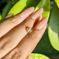 1.27 Ct. Yellowish Green Cabochon Chrysoberyl from Ceylon (Sri Lanka) Life Style