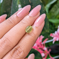 2.19 Ct. Yellowish Green Cabochon Chrysoberyl from Madagascar Life Style