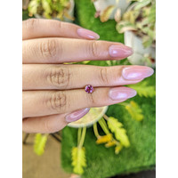 0.56 Ct. Purplish Pink Rhodolite Garnet from Ceylon (Sri Lanka) Life Style