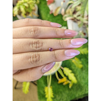 0.32 Ct. Pinkish Purple Rhodolite Garnet from Ceylon (Sri Lanka) Life Style