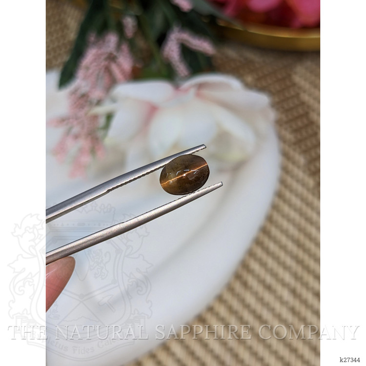 2.32 Ct. Yellowish Brown Cabochon Kornerupine from Ceylon (Sri Lanka)
