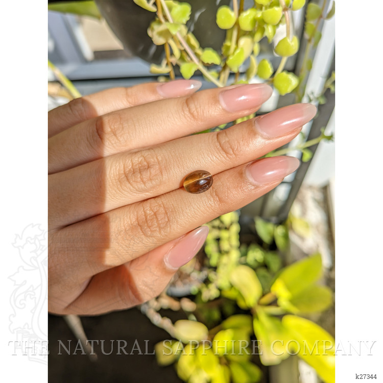 2.32 Ct. Yellowish Brown Cabochon Kornerupine from Ceylon (Sri Lanka)