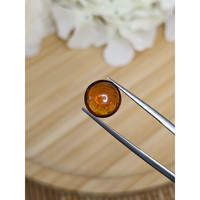 4.37 Ct. Orange Cabochon Hessonite Garnet from Madagascar Life Style