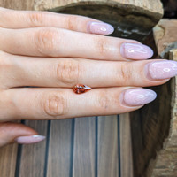 1.37 Ct. Pinkish Orange Imperial Topaz from Brazil Life Style