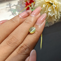 2.55 Ct. Yellowish Green Cabochon Chrysoberyl from Tanzania Life Style