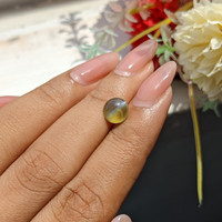 2.09 Ct. Yellowish Green Cabochon Chrysoberyl from Tanzania Life Style